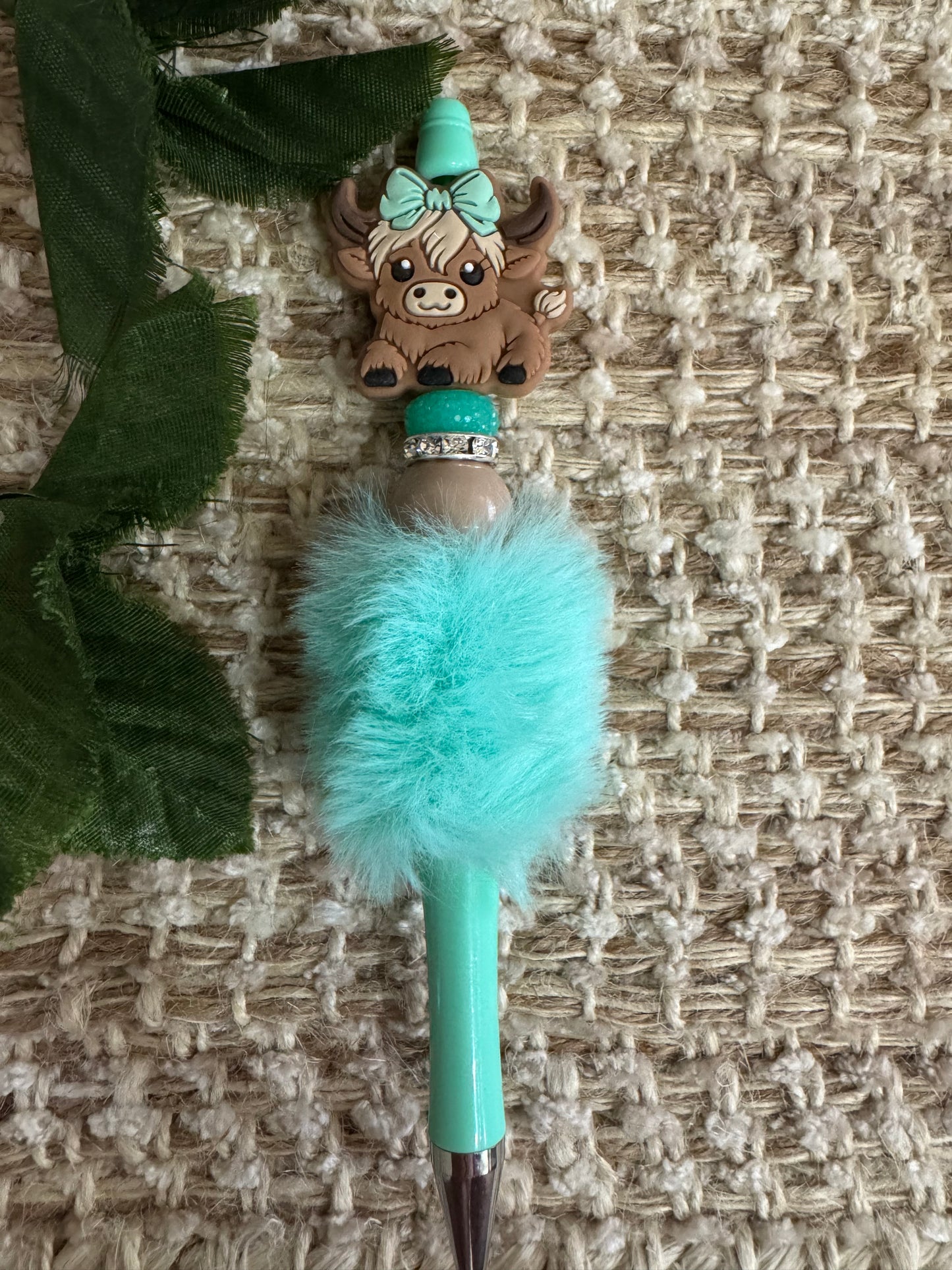 Highland cow w/ bow. P