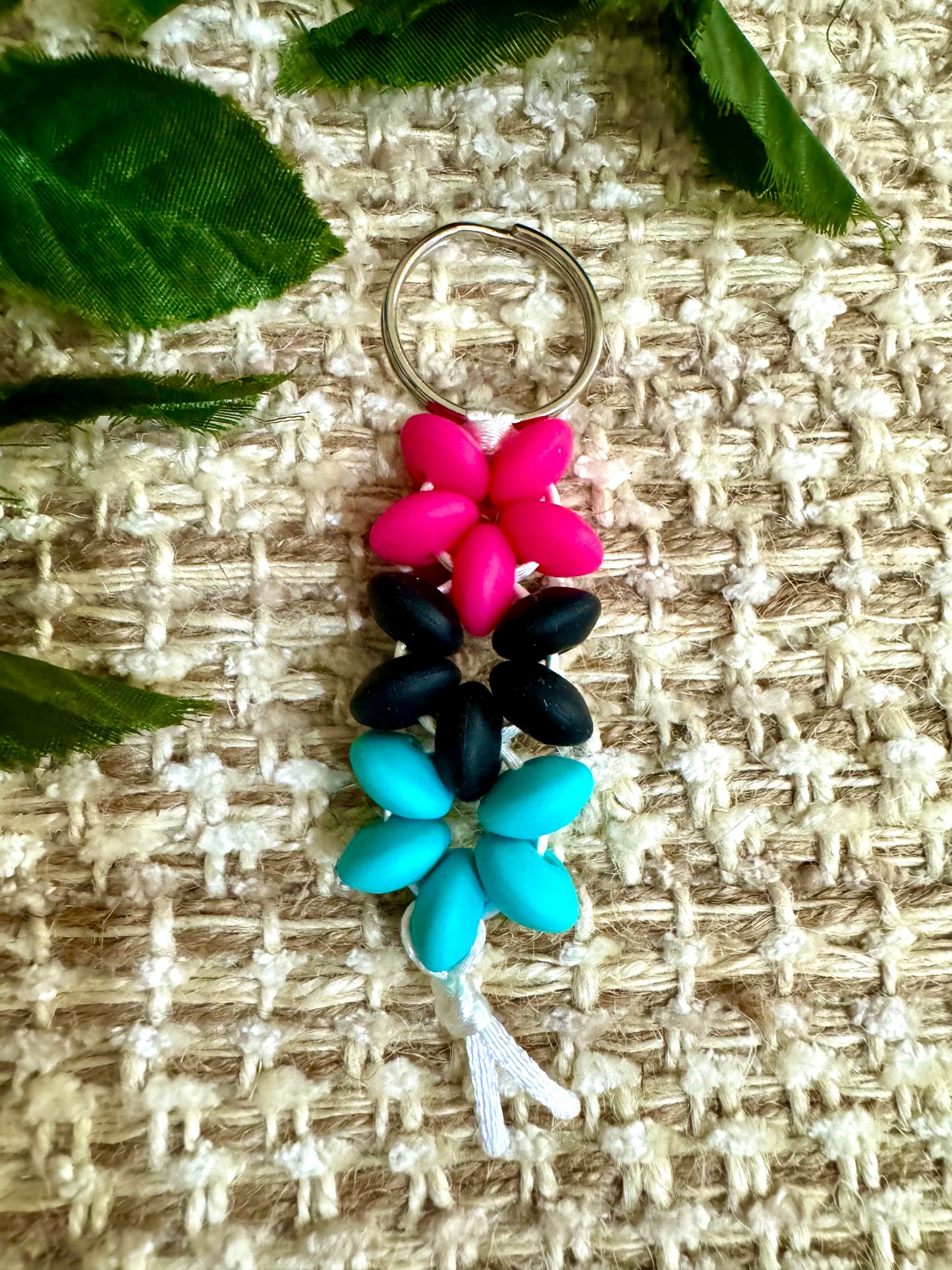 Pnk/blk/teal flowers. I
