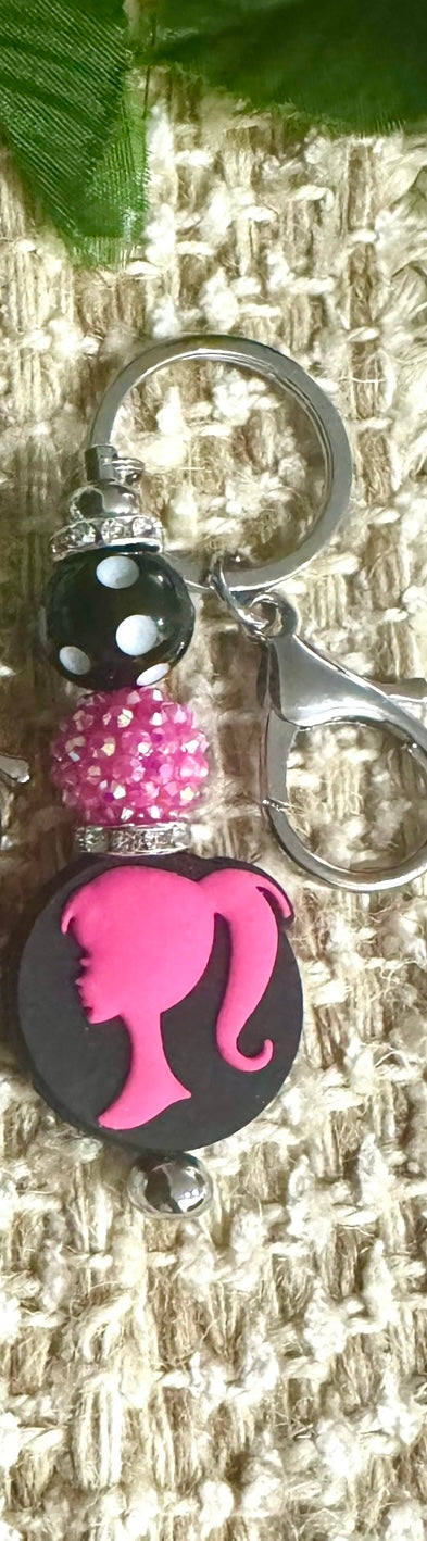 Pink girl doll keychain bar
