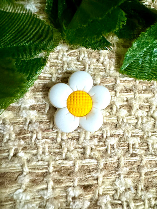 White flower. F